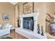 Close-up view of a fireplace with ornate mantel at 37181 N 103Rd St, Scottsdale, AZ 85262