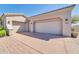 Three-car garage with paver driveway at 37181 N 103Rd St, Scottsdale, AZ 85262