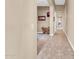 Bright hallway with tile flooring leading to other rooms at 37181 N 103Rd St, Scottsdale, AZ 85262