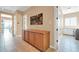Bright hallway with built-in storage and laundry access at 37181 N 103Rd St, Scottsdale, AZ 85262