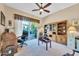 Bright office with built-in shelving and backyard view at 37181 N 103Rd St, Scottsdale, AZ 85262