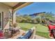 Relaxing patio with seating area overlooking the putting green at 37181 N 103Rd St, Scottsdale, AZ 85262