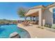 Resort-style pool with built-in BBQ and patio furniture at 37181 N 103Rd St, Scottsdale, AZ 85262