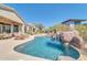 Stunning pool with spacious patio and lounge chairs at 37181 N 103Rd St, Scottsdale, AZ 85262