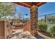 Tennis courts and walkway with desert landscaping at 37181 N 103Rd St, Scottsdale, AZ 85262