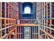 Large wine cellar with numerous wine bottles and a wine cooler at 37181 N 103Rd St, Scottsdale, AZ 85262