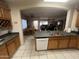 Kitchen with island, ample counter space, and dining area at 3953 W Mustang Ct, Eloy, AZ 85131