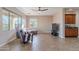 Relaxing living room with built-in bar and entertainment center at 40950 W Bedford Dr, Maricopa, AZ 85138