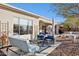 Relaxing patio area with seating and a view at 41704 N Emerald Lake Dr, Anthem, AZ 85086