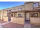 Tan stucco condo building with walkway and small front yards at 4608 W Maryland Ave # 127, Glendale, AZ 85301