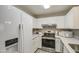 Bright kitchen features modern appliances and ample counter space at 4608 W Maryland Ave # 127, Glendale, AZ 85301