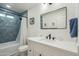 Clean bathroom with a tub and shower combo at 4942 E Wethersfield Rd, Scottsdale, AZ 85254