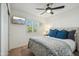 Serene bedroom with ensuite bathroom and a TV at 4942 E Wethersfield Rd, Scottsdale, AZ 85254