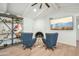 Cozy living room featuring a fireplace and comfortable seating at 4942 E Wethersfield Rd, Scottsdale, AZ 85254