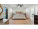 Bright bedroom with pool view and ensuite bathroom at 4942 E Wethersfield Rd, Scottsdale, AZ 85254