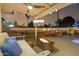 Cozy patio with fire pit and outdoor TV at 4942 E Wethersfield Rd, Scottsdale, AZ 85254