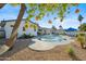 Inviting kidney-shaped pool with a spacious patio at 4942 E Wethersfield Rd, Scottsdale, AZ 85254