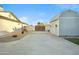 Spacious side yard with concrete and putting green at 4942 E Wethersfield Rd, Scottsdale, AZ 85254