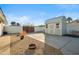 Landscaped side yard with shed and gate at 4942 E Wethersfield Rd, Scottsdale, AZ 85254