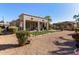 View of backyard, showing desert landscaping and home at 5126 S Sugarberry Ct, Gilbert, AZ 85298