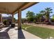Covered patio overlooks the spacious backyard at 5126 S Sugarberry Ct, Gilbert, AZ 85298