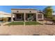 Backyard features artificial turf and desert landscaping at 5126 S Sugarberry Ct, Gilbert, AZ 85298