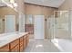 Bathroom with double vanity and a shower/tub combo at 5126 S Sugarberry Ct, Gilbert, AZ 85298