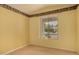 This bright bedroom provides a blank canvas to create a relaxing and comfortable space at 5126 S Sugarberry Ct, Gilbert, AZ 85298