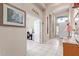 Entryway with tile floors and a wooden console table at 5126 S Sugarberry Ct, Gilbert, AZ 85298