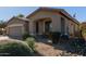 One story house with a covered patio and desert landscaping at 5126 S Sugarberry Ct, Gilbert, AZ 85298