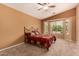 The large main bedroom offers windows with views to the backyard and plenty of space to relax at 5126 S Sugarberry Ct, Gilbert, AZ 85298