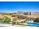 Scenic backyard features mountain views, a pool, and serene landscaping, enhancing outdoor living with privacy at 5528 E Windstone Trl, Cave Creek, AZ 85331