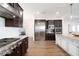 Modern kitchen featuring stainless steel appliances, granite countertops, and custom cabinetry at 5528 E Windstone Trl, Cave Creek, AZ 85331