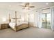 Spacious main bedroom with a ceiling fan, ensuite bathroom, and natural light provides a relaxing and comfortable retreat at 5528 E Windstone Trl, Cave Creek, AZ 85331
