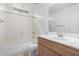 Simple bathroom with shower and wood vanity at 615 E Portland St # 112, Phoenix, AZ 85004