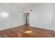 Bright bedroom with hardwood floors and spacious closet at 615 E Portland St # 112, Phoenix, AZ 85004