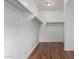 Large walk-in closet with double hanging rods at 615 E Portland St # 112, Phoenix, AZ 85004