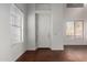 Bright entryway with white door and brown floor at 615 E Portland St # 112, Phoenix, AZ 85004