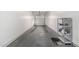 Single car garage with extra storage shelving at 615 E Portland St # 112, Phoenix, AZ 85004