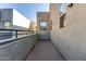 Private patio with city views and stucco walls at 615 E Portland St # 112, Phoenix, AZ 85004