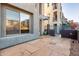 Stone patio adjacent to the townhome at 615 E Portland St # 112, Phoenix, AZ 85004