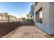 Small patio with stone flooring and landscaping at 615 E Portland St # 112, Phoenix, AZ 85004