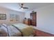 Bedroom with hardwood floors and ceiling fan at 710 E Hayward Ave, Phoenix, AZ 85020