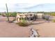 Aerial view of a unique circular home with desert landscaping at 751 E Moon Vista St, Apache Junction, AZ 85119