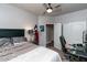 Spacious bedroom with a king-size bed and home office at 758 S Lagoon Dr, Gilbert, AZ 85233