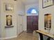 Bright and spacious entryway with double doors and decorative niches at 758 S Lagoon Dr, Gilbert, AZ 85233