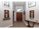 Bright and spacious entryway with hardwood floors and decorative niches at 758 S Lagoon Dr, Gilbert, AZ 85233