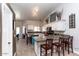 Eat-in kitchen with granite countertops and island at 758 S Lagoon Dr, Gilbert, AZ 85233