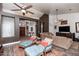 Spacious living room with comfortable seating and a large TV at 758 S Lagoon Dr, Gilbert, AZ 85233