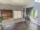 Inviting living room with sliding glass doors leading to an outdoor area with tile floors at 758 S Lagoon Dr, Gilbert, AZ 85233
